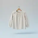 bluzka — de blouse